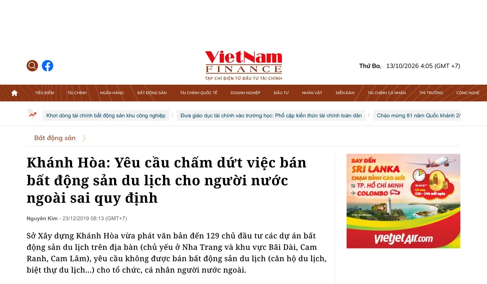 Financial news web page with a headline about Khanh Hoa ordering developers to stop selling tourism real estate to foreigners
