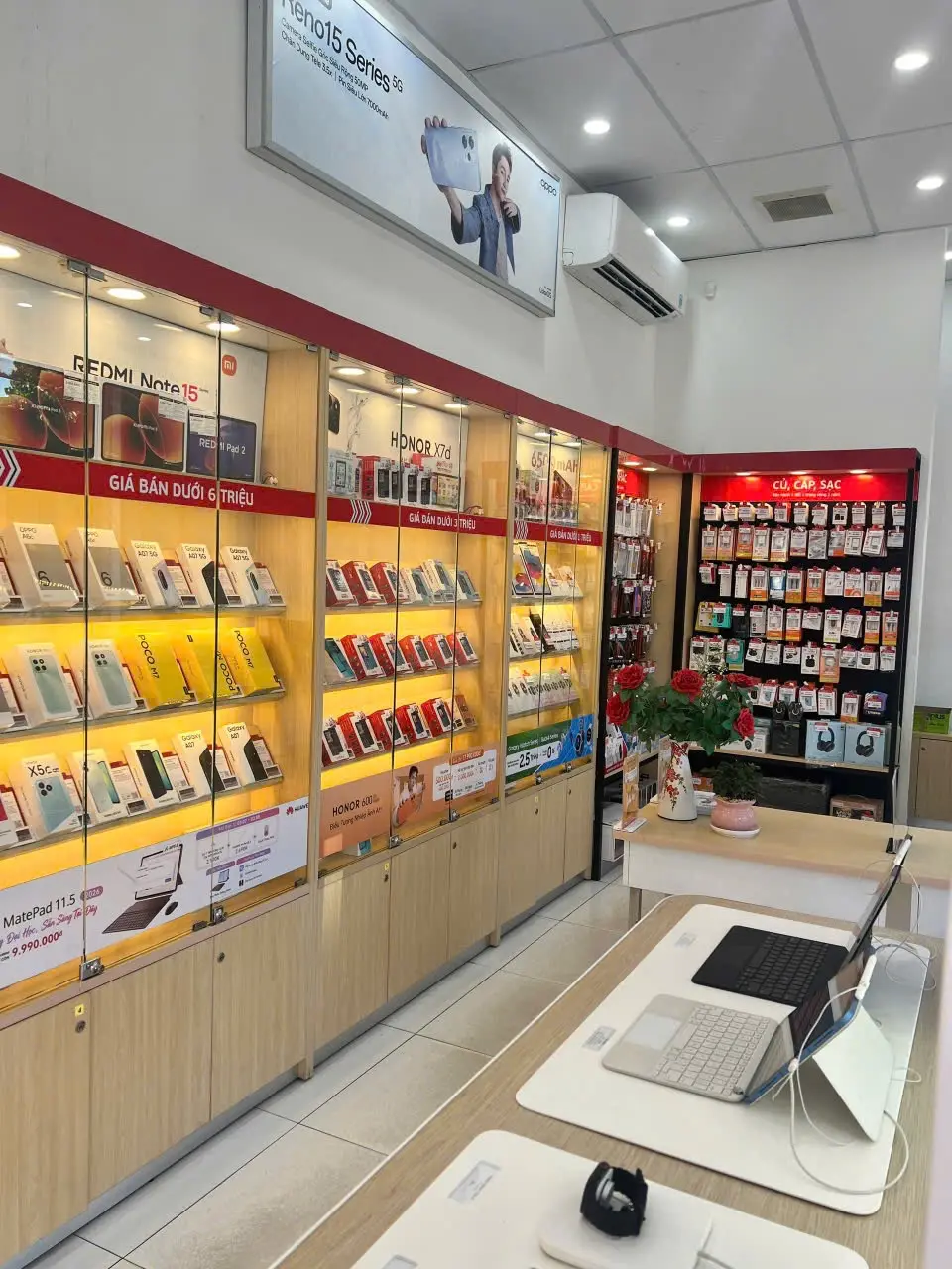 Glass shelves of phone accessories inside a Viettel Store
